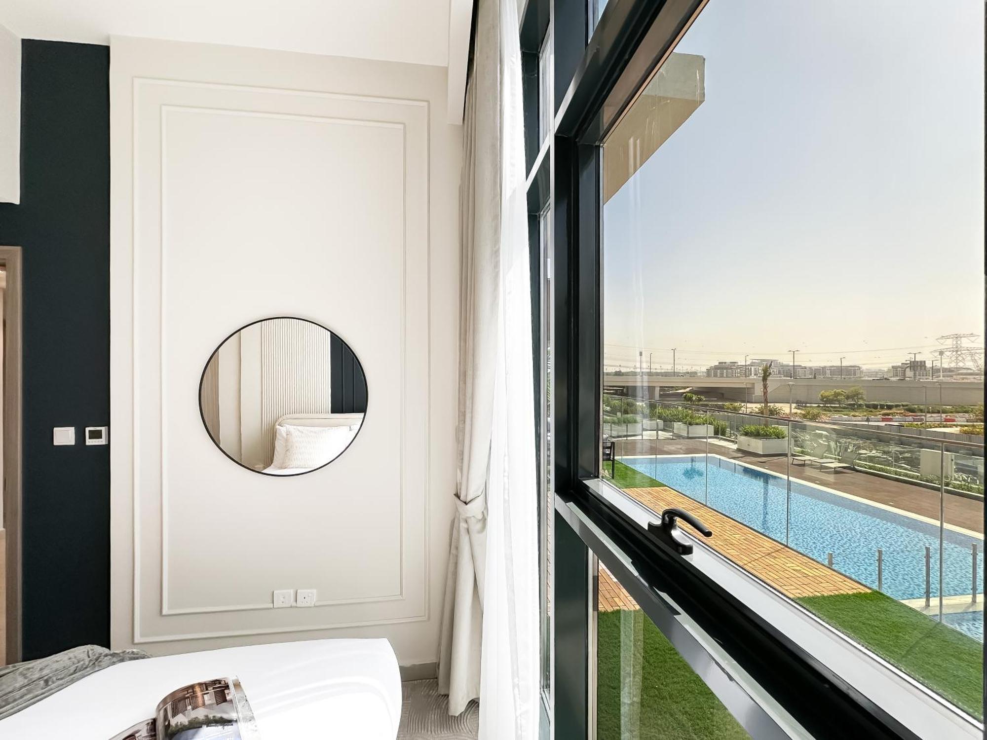 Apartment Exquisite 2br Oasis W Pool View In Meydan Dubai